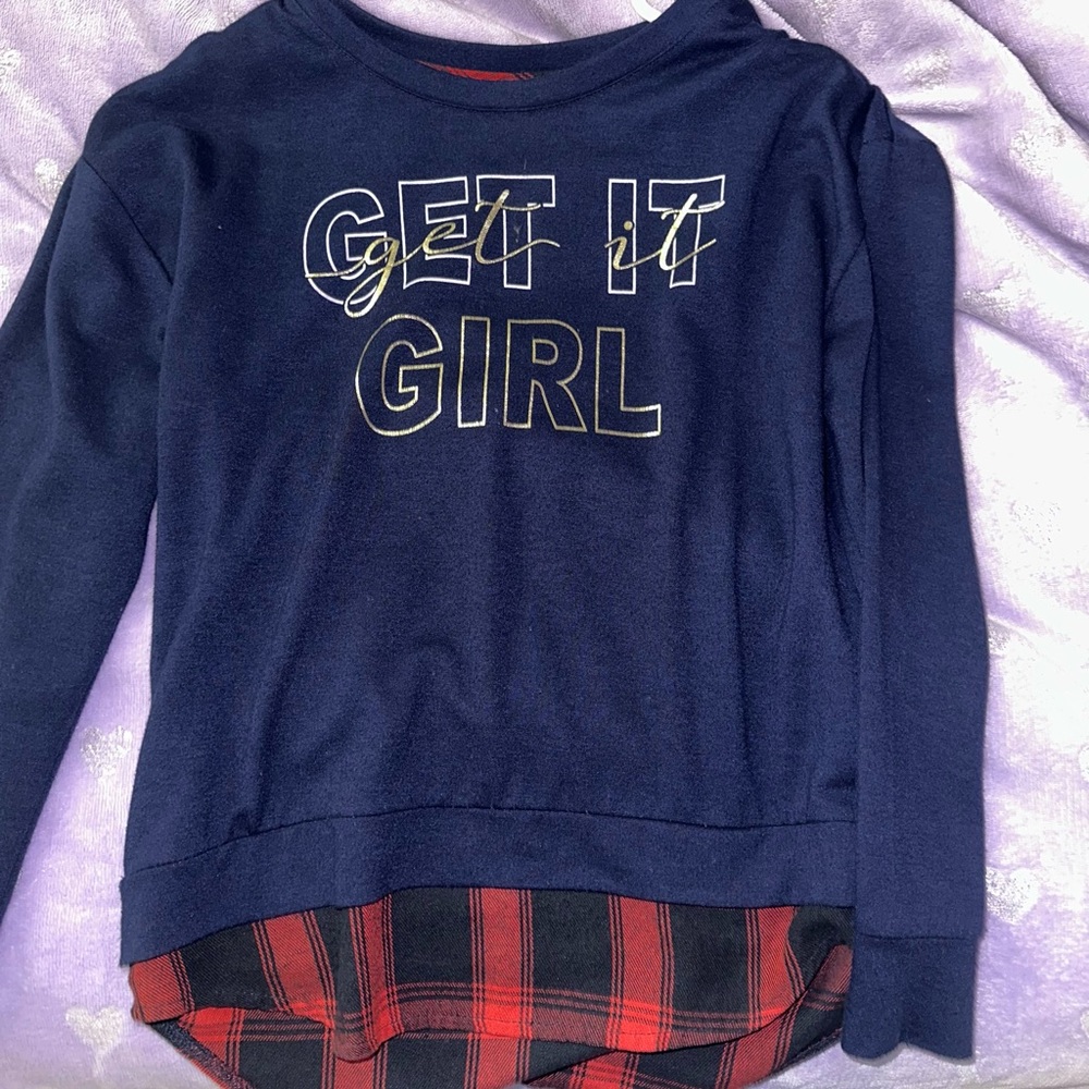 Navy sweater with gold lettering and red accents